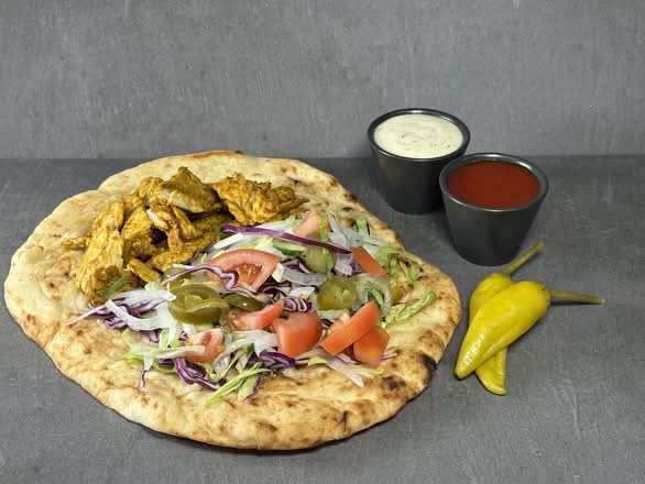 Trident vegan tikka naan with salad and dips